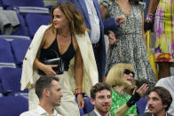 Emma Watson, left, and Anna Wintour, right, settle in to watch play between Karolina Muchova, of the Czech Republic, and Sorana Cirstea, of Romania, during the quarterfinals of the U.S. Open tennis championships, Tuesday, Sept. 5, 2023, in New York. (AP Photo/Charles Krupa)