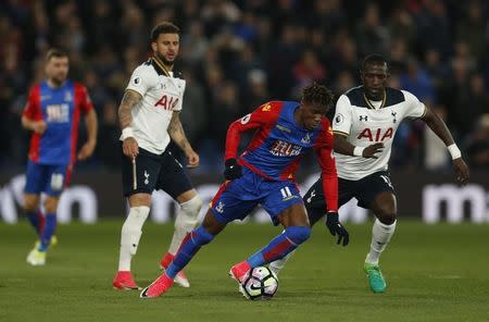 Britain Soccer Football - Crystal Palace v Tottenham Hotspur - Premier League - Selhurst Park - 26/4/17 Crystal Palace's Wilfried Zaha in action with Tottenham's Moussa Sissoko and Kyle Walker Action Images via Reuters / Matthew Childs Livepic