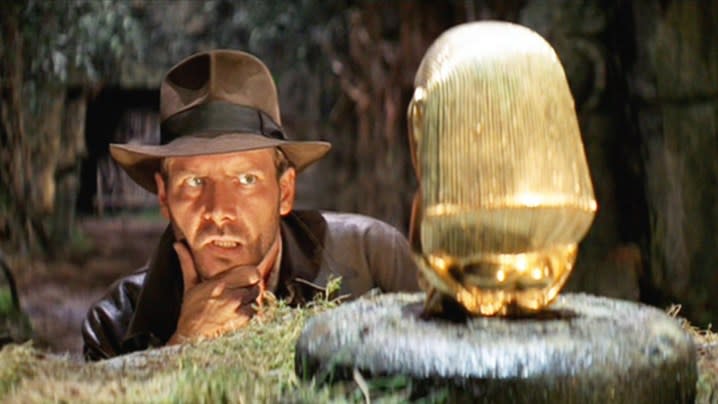 Indiana Jones contemplating how to take an artifact without setting off a trap in Raiders of the Lost Ark.