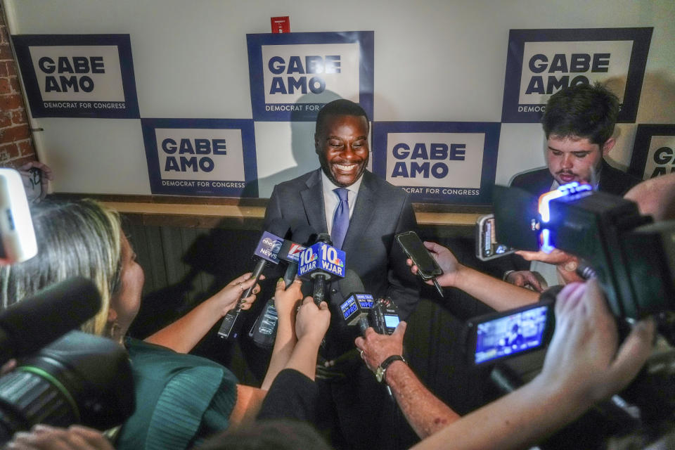 FILE - Gabe Amo meets with members of the press at an election results party after his win in the Democratic primary for Rhode Island's 1st Congressional District, Sept. 5, 2023, in Pawtucket, R.I. (David Delpoio/Providence Journal via AP, File)