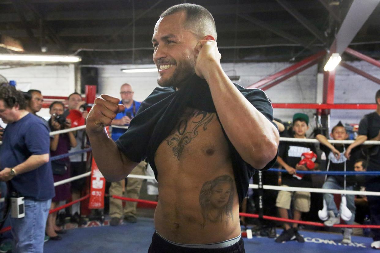 Mike Alvarado poses in the ring during a workout in front of the media in Bell, Calif., Wednesday, May 14, 2014. He and Juan Manuel Marquez, of Mexico, are preparing for their WBO welterweight elimination bout at the Forum in Inglewood, Calif., Saturday. The winner will become the mandatory challenger to WBO welterweight champion Manny Pacquiao. (AP Photo/Nick Ut)