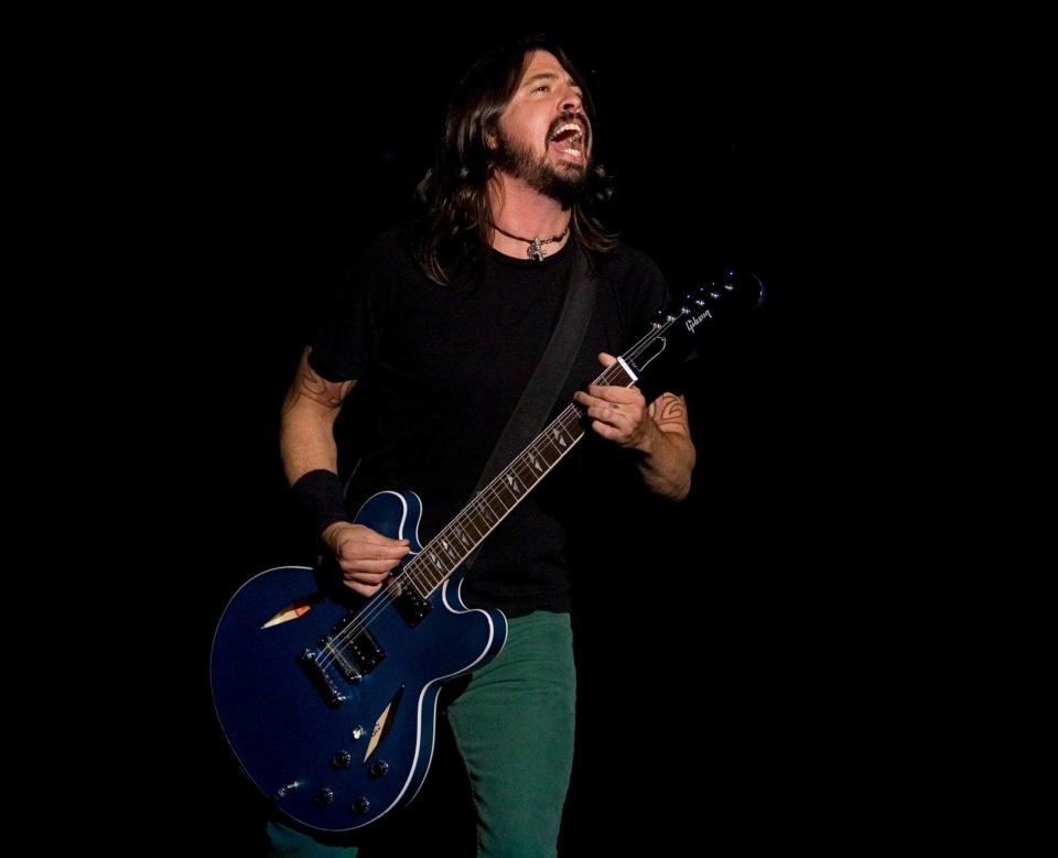 Dave Grohl, shown here playing the Austin City Limits Music Festival in 2008, is back to headline both weekends with his band Foo Fighters. He'll also be in conversation with Brené Brown on Friday on ACL's bonus tracks stage.