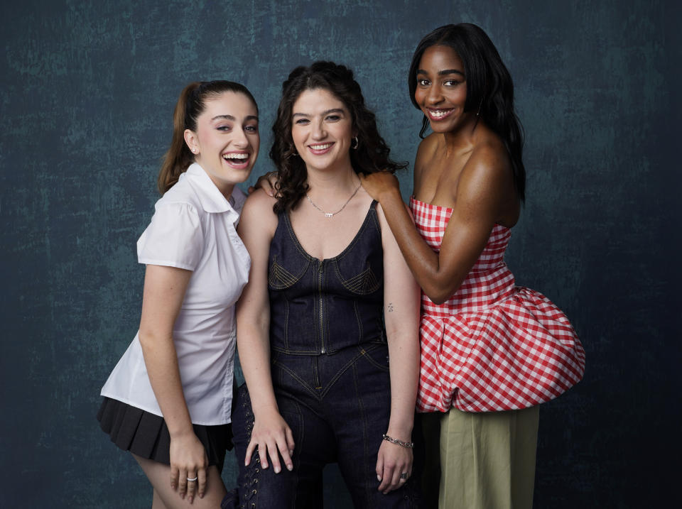 Emma Seligman, center, director/co-writer of the film "Bottoms," poses for a portrait with cast member/co-writer Rachel Sennott, left, and cast member Ayo Edebiri, Thursday, June 29, 2023, in West Hollywood, Calif. (AP Photo/Chris Pizzello)