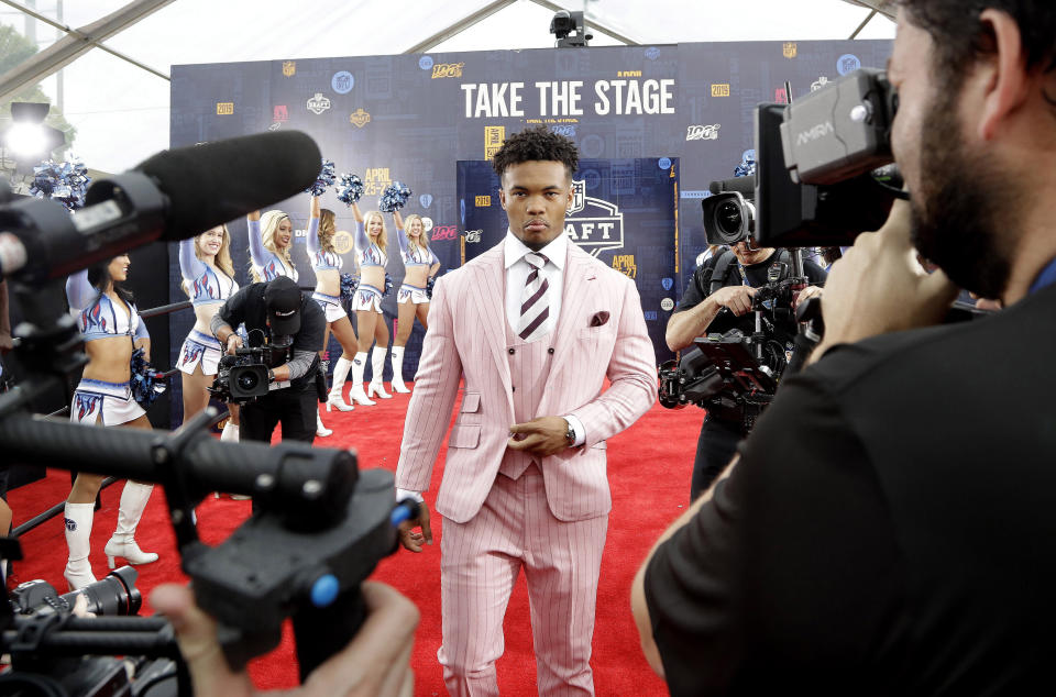 Oklahoma quarterback Kyler Murray walks the red carpet ahead of the first round at the NFL football draft, Thursday, April 25, 2019, in Nashville, Tenn. (AP Photo/Steve Helber)