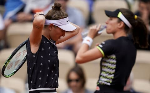 Czech Republic's Marketa Vondrousova (L) and Britain's Johanna Konta warm up at the start of their women's singles semi-final match on day 13 of The Roland Garros 2019 French Open tennis tournament in Paris on June 7, 2019 - Credit: AFP