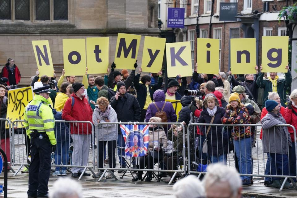 Protesters await the arrival of Charles and the Queen Consort for the Royal Maundy Service at York Minster (Owen Humphreys/PA) (PA Wire)