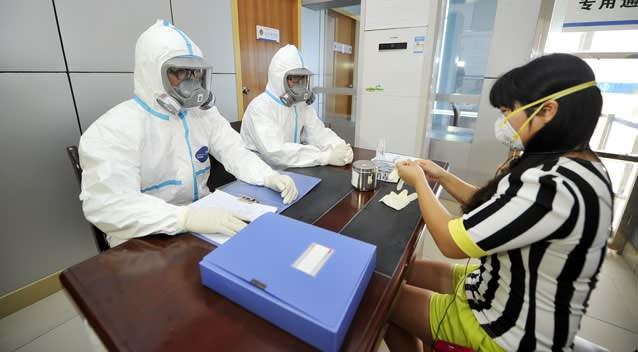 Quarantine officers attend an excercise to prevent Ebola virus. Photo: Getty