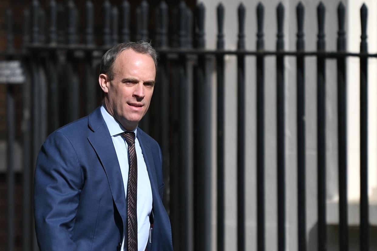 Britain's Foreign Secretary Dominic Raab arrives in Downing Street in central London on May 7, 2020 for the daily novel coronavirus COVID-19 briefing. - The British government was on May 7 reviewing lockdown measures introduced to combat the coronavirus outbreak, with a partial easing expected to be announced this weekend. (Photo by DANIEL LEAL-OLIVAS / AFP) (Photo by DANIEL LEAL-OLIVAS/AFP via Getty Images)