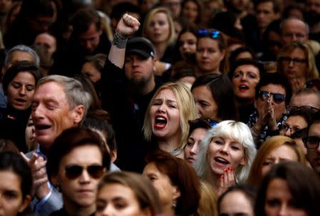 A woman shouts slogans as she takes part in an abortion rights campaigners' demonstration "Black Protest" in front of the Parliament in Warsaw, Poland October 1, 2016. REUTERS/Kacper Pempel/File Photo