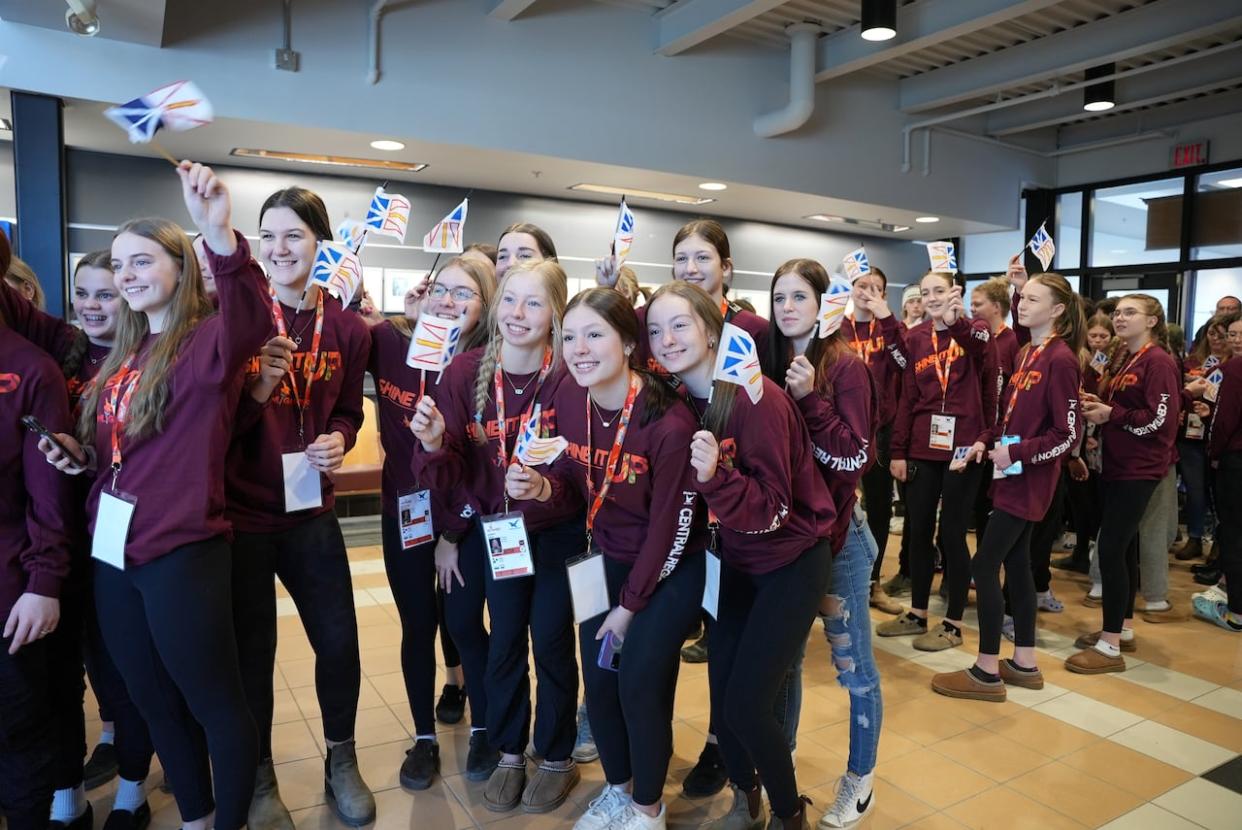 Some of the Central region's female athletes await to enter the closing ceremonies of the 2024 N.L. Winter Games. (David Newell/CBC - image credit)