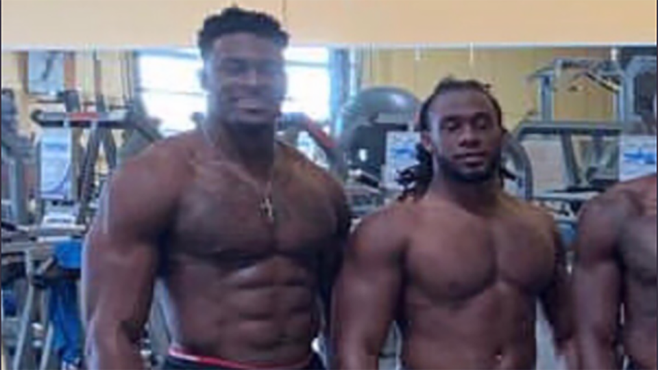 DK Metcalfe poses in the gym alongside teammate AJ Brown.