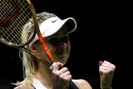 Tennis - WTA Tour Finals - Singapore Indoor Stadium, Kallang, Singapore - October 21, 2018 Ukraine's Elina Svitolina celebrates winning her group stage match against Czech Republic's Petra Kvitova REUTERS/Edgar Su