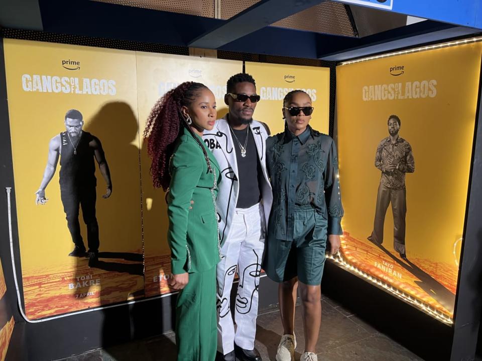 Adesua Etomi-Wellington (L), Tobi Bakre (C), and Chioma Akpotha (R) pose at the New York City premiere of their Amazon Studios original film, Gangs of Lagos, on April 13, 2023. (theGrio Photo/Chinekwu Osakwe)