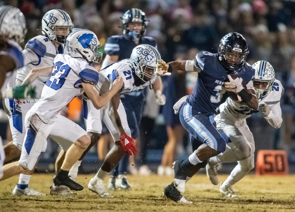 Berkely Prep (3 ) Xavier Townsend outruns Lakeland Christian defenders during first half action at in Tampa Fl. Friday December 3 2021.  ERNST PETERS/ THE LEDGER