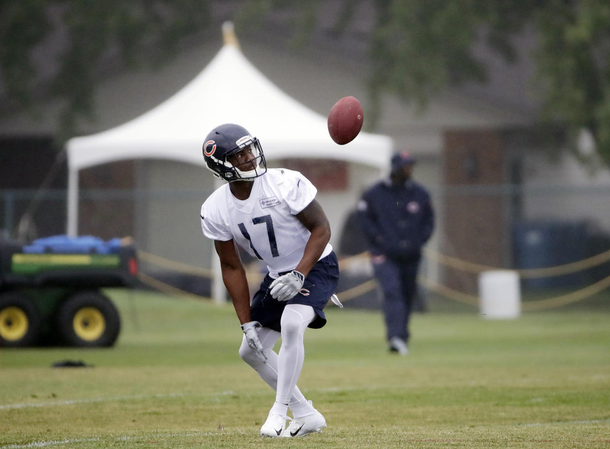 Chicago Bears wide receiver Anthony Miller tries to catch a ball during an NFL football training camp in Bourbonnais, Ill., Saturday, July 21, 2018. (AP Photo/Nam Y. Huh)