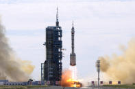A Long March-2F Y12 rocket carrying a crew of Chinese astronauts in a Shenzhou-12 spaceship lifts off at the Jiuquan Satellite Launch Center in Jiuquan in northwestern China, Thursday, June 17, 2021. China has launched the first three-man crew to its new space station in its the ambitious programs first crewed mission in five years. (AP Photo/Ng Han Guan)