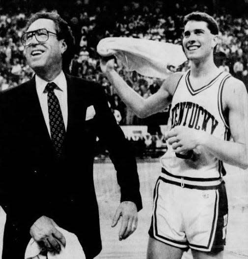 MARCH 20, 1988: Kentucky head coach Eddie Sutton and guard Rex Chapman respond to UK fans after defeating Maryland, 90-81, at Riverfront Coliseum.