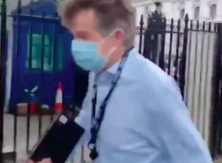 Nicholas Watt was filmed being confronted by protesters in Whitehall.