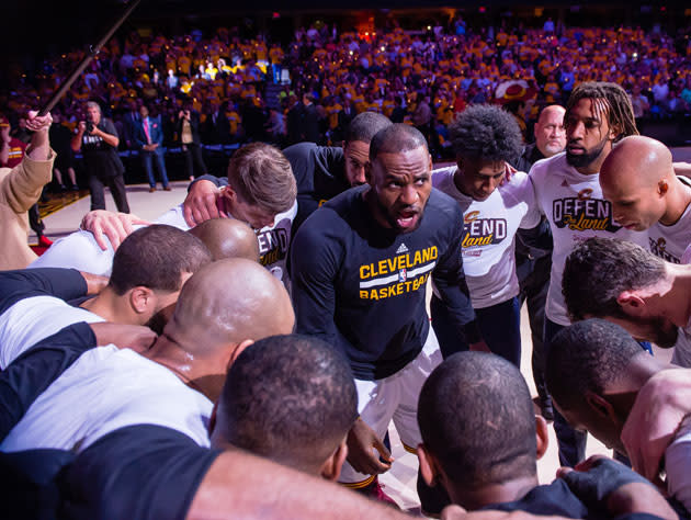 LeBron James reminds the crew that Wingerz sells apps past 11:30. (Getty Images)