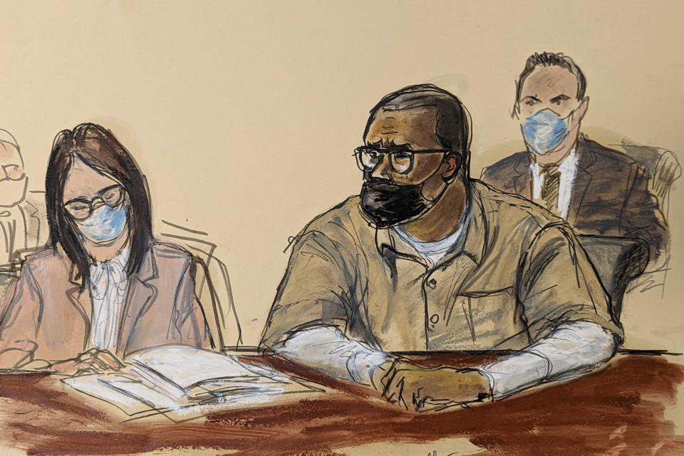 In this courtroom sketch, R. Kelly and his attorney Jennifer Bonjean, left, appear during his sentencing hearing in federal court on June 29, 2022, in New York. The former R&B superstar was convicted of racketeering and other crimes.