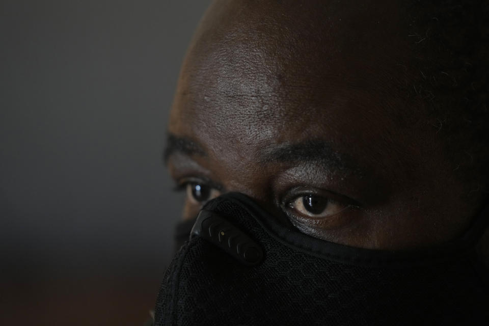 Freddie Davis, whose landlord raised his rent by 60 percent in the same month he lost his job as a truck driver, talks with AP journalists in his apartment as he prepares for an eviction that he knows could come at any time, Thursday, Sept. 2, 2021, in Miami. "I never thought I'd be in this situation. I've been working my whole life," said Davis, who lost a leg to diabetes, suffers from congestive heart failure, and is recovering from multiple wounds on his other leg and foot. (AP Photo/Rebecca Blackwell)