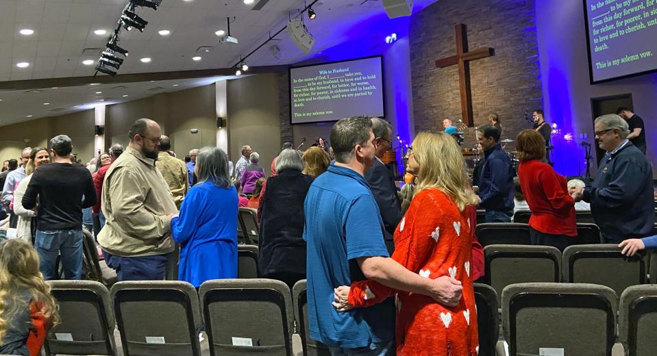 More than 100 couples renewed their wedding vows at Edmond's Acts 2 Church, where a vow renewal ceremony served as a nod to the convergence of Valentine's Day with Ash Wednesday. [Carla Hinton]