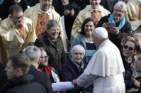 Pope Francis salutes faithful as he arrives in Freedom Square to celebrate a Mass in Tallinn, Estonia, Tuesday, Sept. 25, 2018. Pope Francis concludes his four-day tour of the Baltics visiting Estonia. (AP Photo/Andrew Medichini)