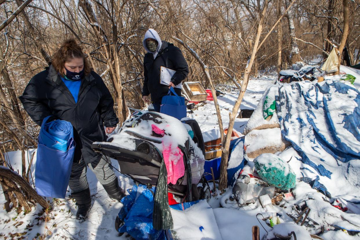 Topeka's mayor and city council voted late Tuesday to hire a consultant to help this community better serve its homeless, though strings are attached.