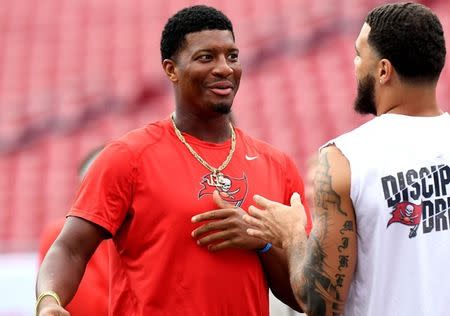 Aug 30, 2018; Tampa, FL, USA; Tampa Bay Buccaneers quarterback Jameis Winston (3) talks with wide receiver Mike Evans (13) before the start of a game against the Jacksonville Jaguars at Raymond James Stadium. Mandatory Credit: Jonathan Dyer-USA TODAY Sports