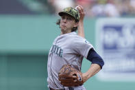 Seattle Mariners' Logan Gilbert winds up for a pitch against the Boston Red Sox in the first inning of a baseball game Sunday, May 22, 2022, in Boston. (AP Photo/Steven Senne)