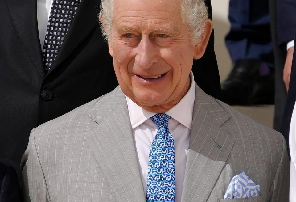 King Charles wearing a tie emblazoned with images of the Greek flag (AP)