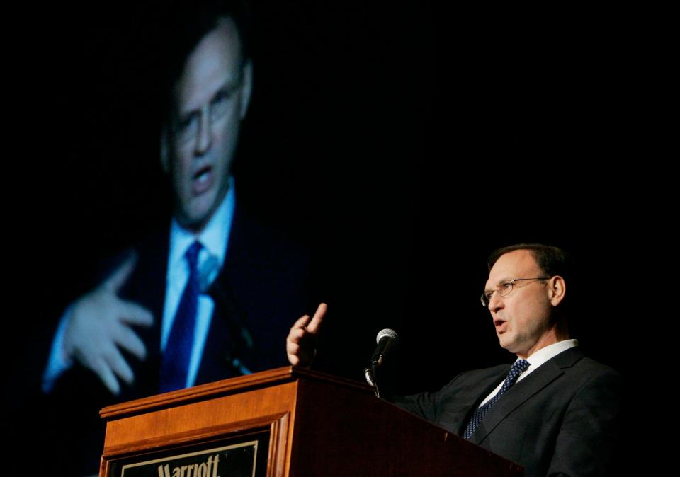 Supreme Court Justice Samuel Alito delivers remarks during a Federalist Society dinner gathering in November 2006 less than a year after his confirmation.