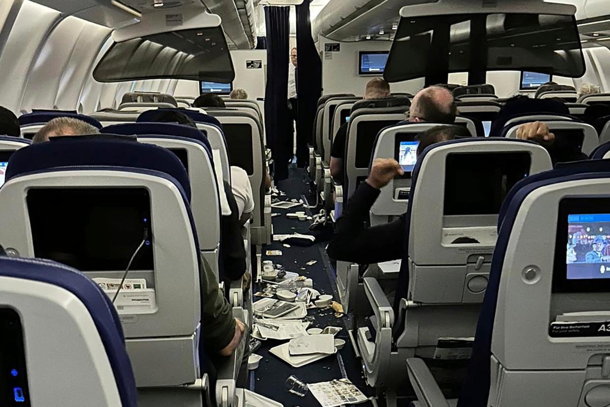Lufthansa flight 469 from Austin, Texas to Frankfurt, Germany experienced "significant turbulence" on March 1, 2023. This is what the cabin looked like in the aftermath. Seven people were hospitalized as a result and the flight diverted to Washington Dulles Airport. (Ecaterina Fadhel/via AP Photo)