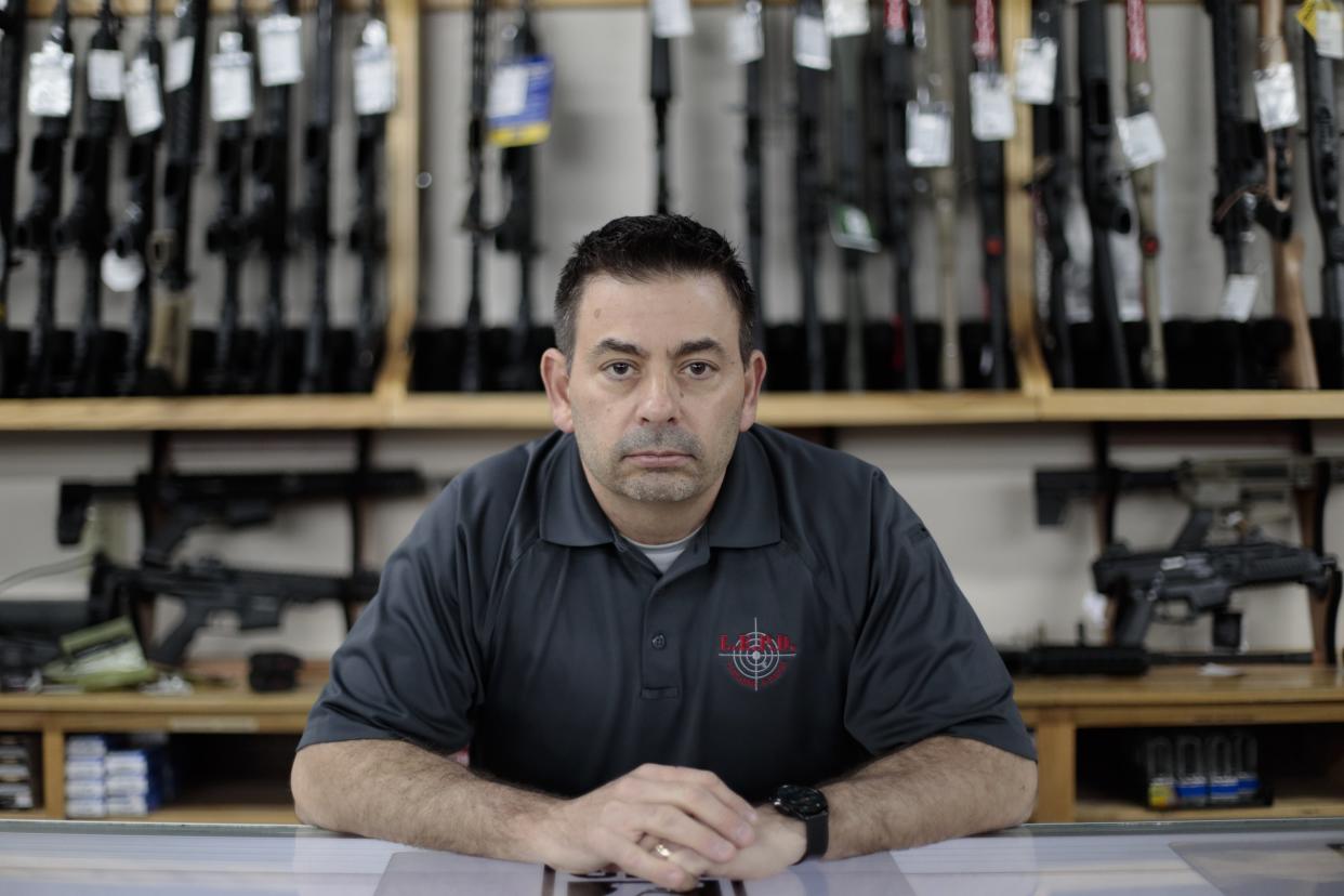 Eric Delbert, owner of L.E.P.D. Firearms, Range and Training Facility, poses for a portrait inside his store on Tuesday, Apr. 13, 2021 in Columbus.  Ohio state lawmakers introduced legislature to eliminate sales taxes on firearms.