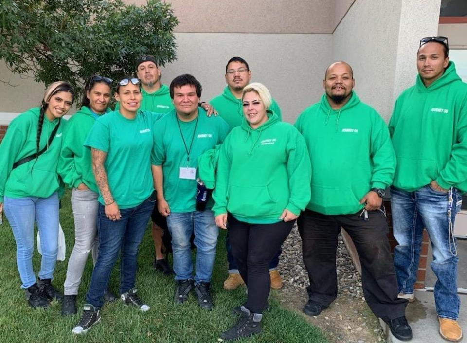 Journey On team members, all of them Indigenous and many of them experienced with homelessness themselves, work the streets of Rapid City wearing signature green apparel to forge personal connections with homeless people in the interest of public safety.