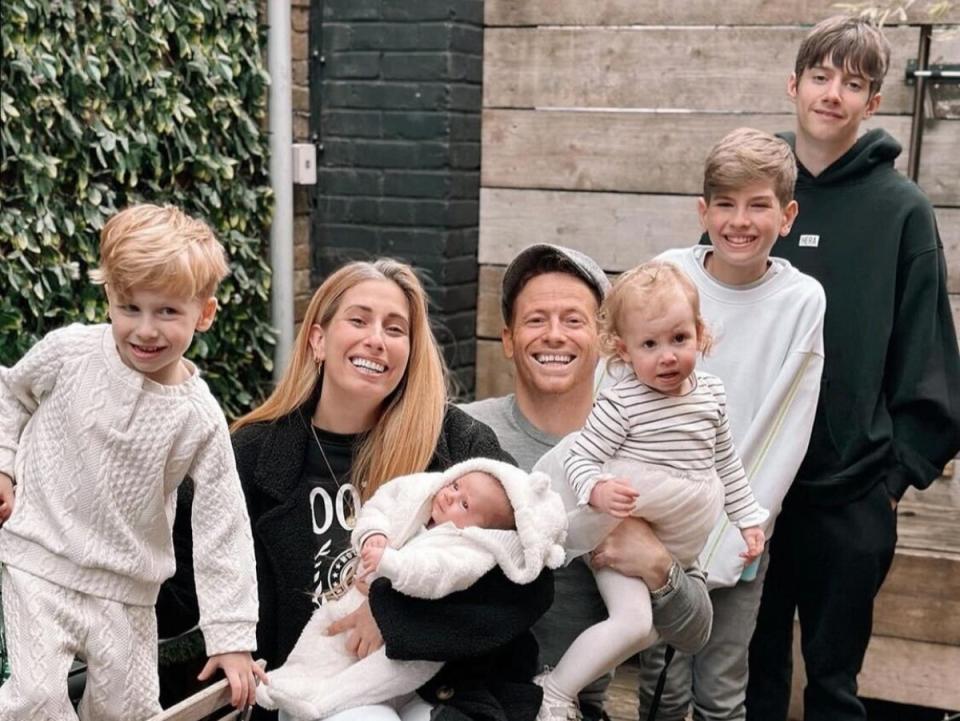 Stacey Solomon and Joe Swash pose with five of their children (Instagram/Stacey Solomon)
