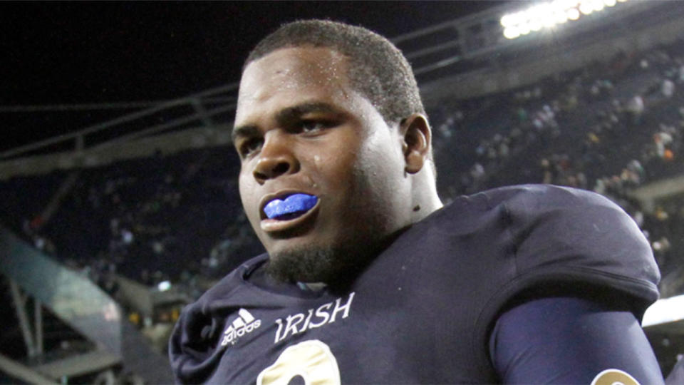 Pictured here, Louis Nix III in action during a college football game for Notre Dame.