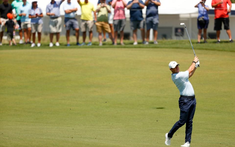 Rory McIlroy of Northern Ireland plays a shot during a practice round  - Getty Images