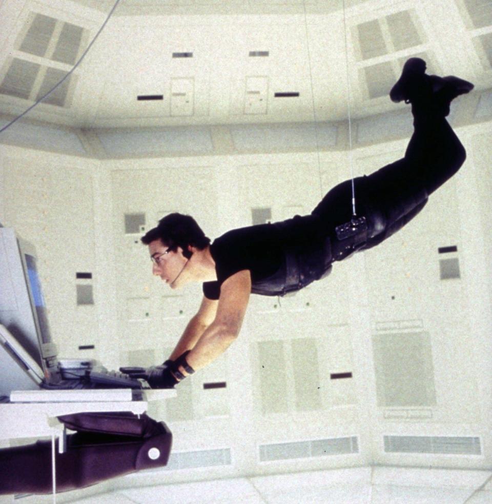 Tom Cruise in the famed Langley break-in scene from 1996's “Mission: Impossible.”