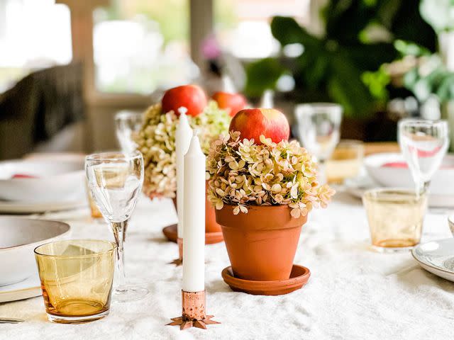 <p><a href="https://mostlovelythings.com/how-to-make-a-fall-centerpiece-with-apples-hydrangeas/" data-component="link" data-source="inlineLink" data-type="externalLink" data-ordinal="1">Most Lovely Things</a></p>