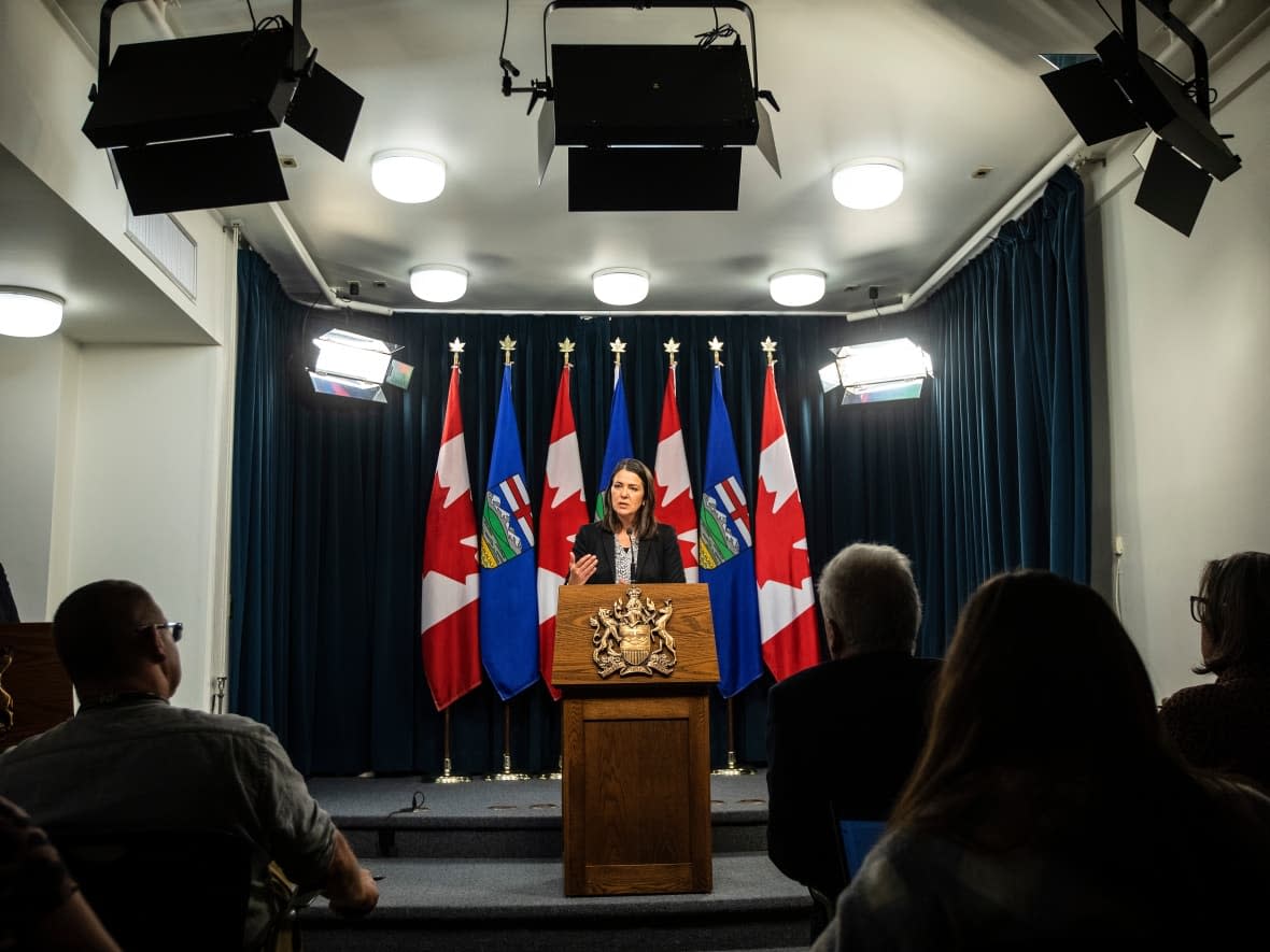 Premier Danielle Smith announced her new cabinet Friday with some key ministers staying in place, including Health Minister Jason Copping, Justice Minister Tyler Shandro and Education Minister Adriana LaGrange. (Jason Franson/The Canadian Press - image credit)