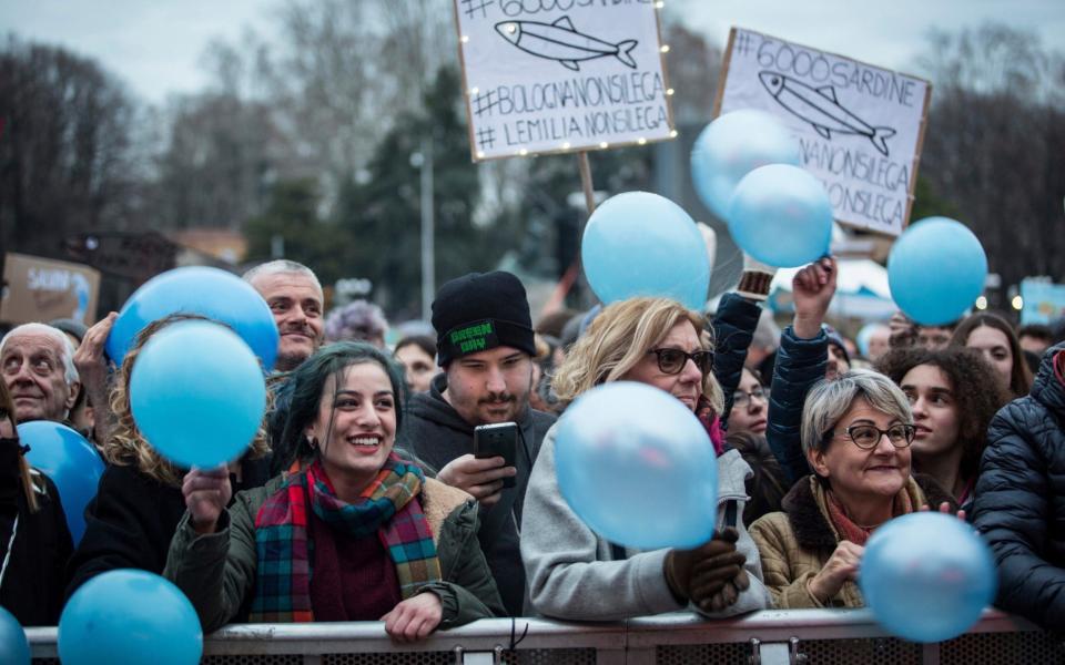 People gather in Piazza VIII Agosto square in Bologna, Italy, during a demonstration of the Sardines movement, an Italian grass-roots movement against right-wing populism - LaPresse