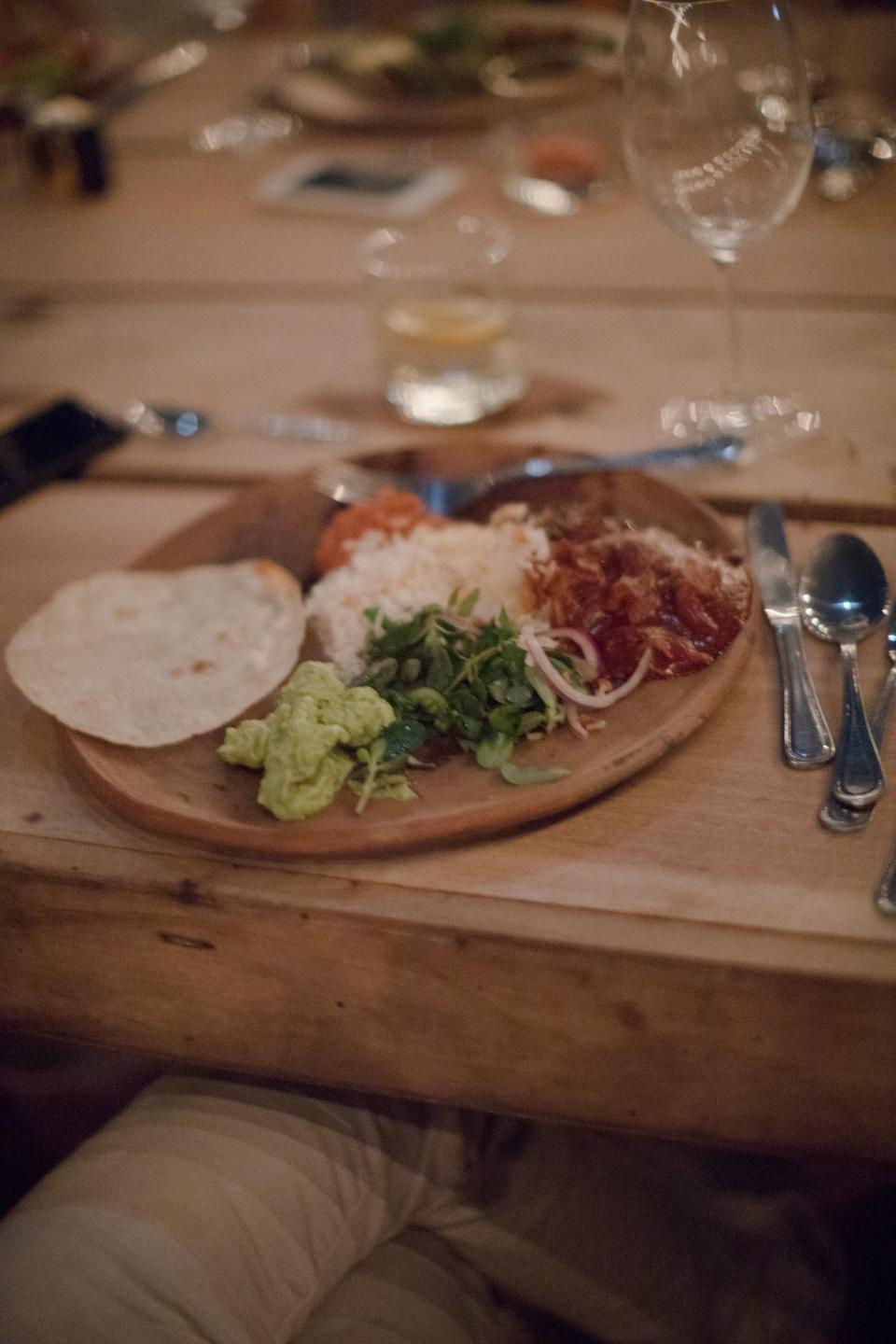 At the rehearsal dinner, we had handmade tortillas, chicken mole, avocados, and cilantro salad.