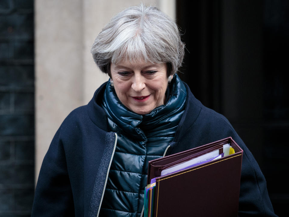 Theresa May leaves Downing Street ahead of Prime Minister's Questions: Getty