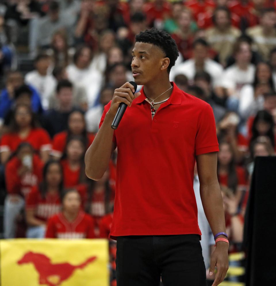 Jarrett Culver, a former Texas Tech standout, talks to the crwod during a ceremony for his retired jersey Feb. 18 at Coronado High School in Lubbock. Culver, who plays for the Minnesota Timberwolves, flew back to Lubbock to see his family a few weeks ago, which was when he recorded the PSA.