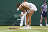 Germany's Tatjana Maria celebrates defeating Germany's Jule Niemeier in a women's singles quarterfinal match at the Wimbledon tennis championships in London, Tuesday July 5, 2022. (AP Photo/Kirsty Wigglesworth)