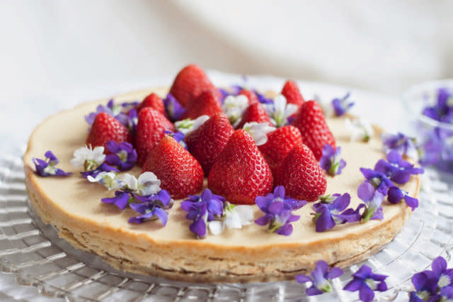 <strong>Get the <a href="http://willfrolicforfood.com/2014/04/chevre-cheesecake-w-strawberries-edible-flowers-pistachio-crust-gluten-free.html" target="_blank">Chevre Cheesecake with Strawberries, Edible Flowers and a Pistachio Crust recipe</a> from Will Frolic For Food</strong>