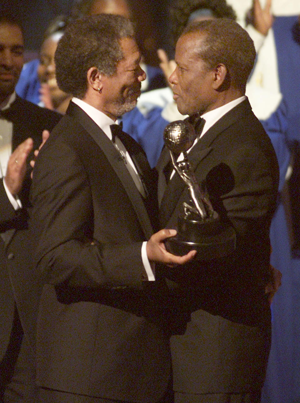 Morgan Freeman presented Sidney Poitier with the Hall of Fame at the 32nd NAACP Image Awards at the Universal Amphitheatre in Los Angeles on March 3, 2001. - Credit: Kevin Winter/Getty Images