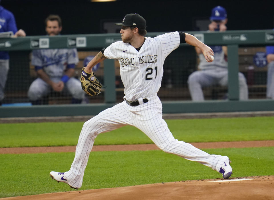 FILE - Colorado Rockies starting pitcher Kyle Freeland works against the Los Angeles Dodgers during the first inning of a baseball game in Denver, in this Thursday, Sept. 17, 2020, file photo. Kyle Freeland gets the reality: All-Star third baseman Nolan Arenado traded away, the Colorado Rockies instantly written off. That doesn’t mean the left-hander agrees with it. (AP Photo/David Zalubowski, File)