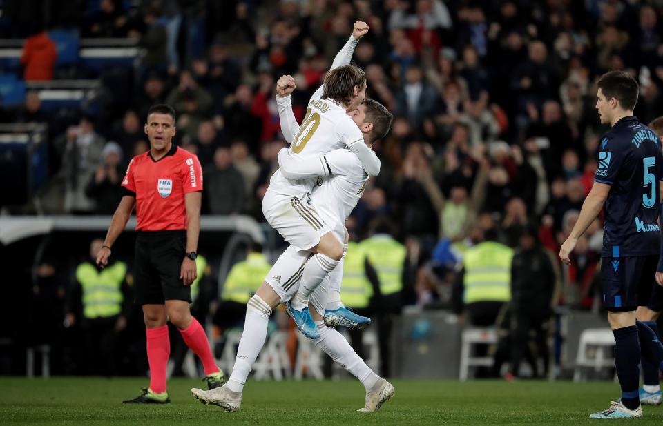 MADRID, SPAIN - NOVEMBER 23 : Federico Valverde (2nd R) of Real Madrid celebrates with his teammate Luka Modric (2nd L) after scoring during the Spanish league (La Liga) football match between Real Madrid CF and Real Sociedad at the Santiago Bernabeu Stadium in Madrid, Spain on November 23, 2019.  (Photo by Burak Akbulut/Anadolu Agency via Getty Images)